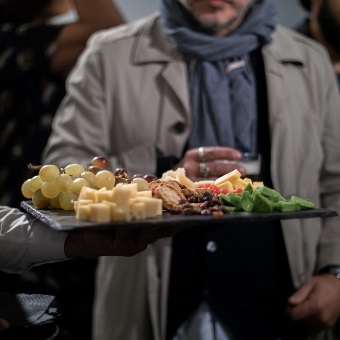 Waiter holding sliders