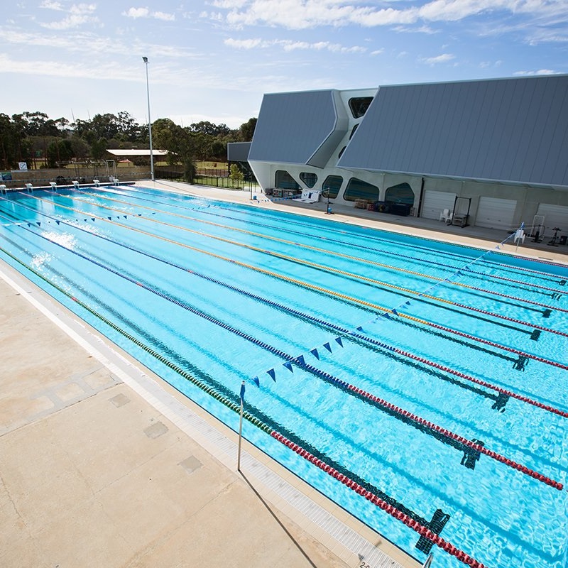 HBF Stadium outdoor 8 lane pool with WAIS in the background