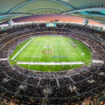 A photo taken from the nosebleeds of the Optus Stadium field ready to host a game of rugby